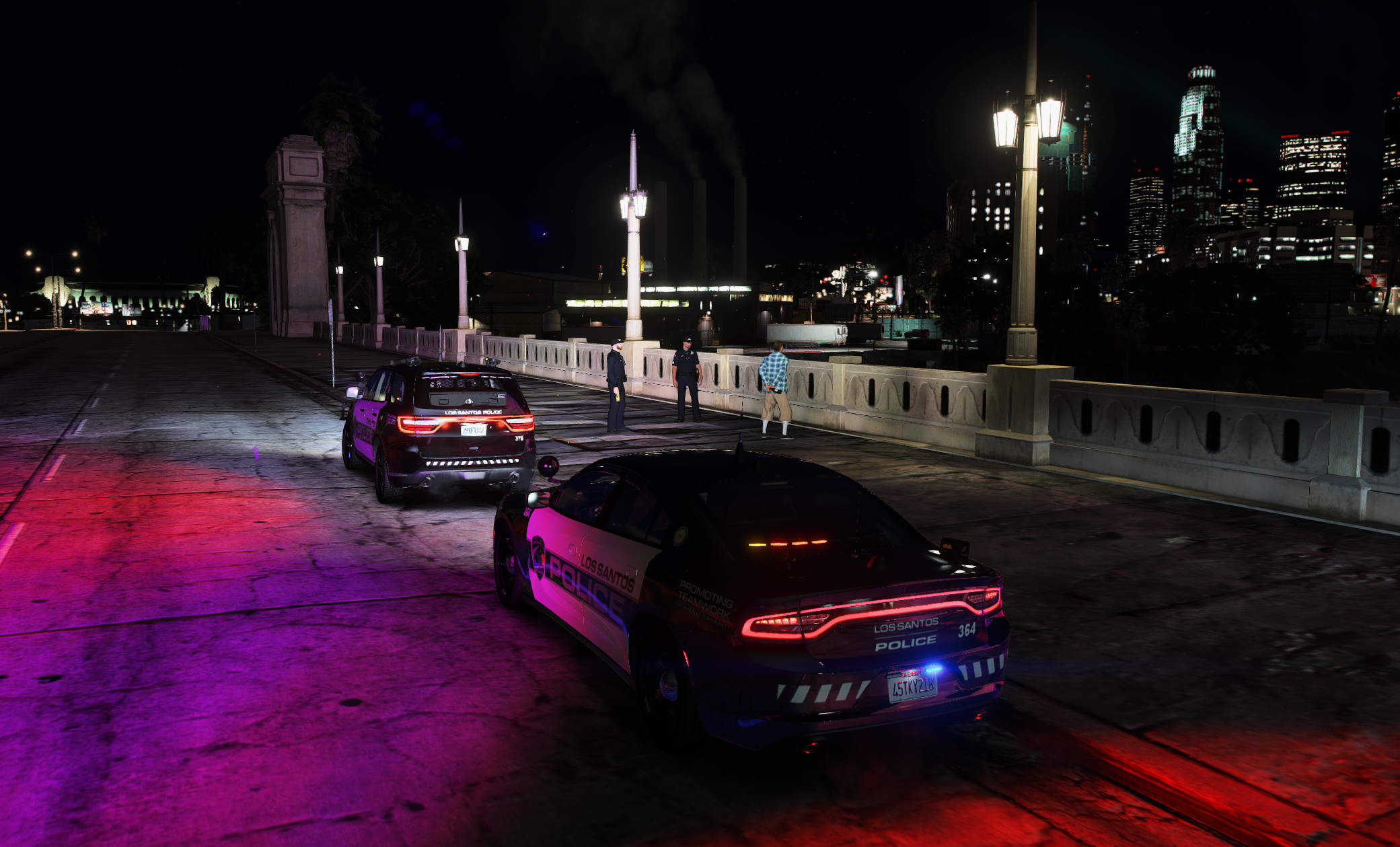 LSPD officers attend to a jumper on the bridge and detain them before any harm occurs.